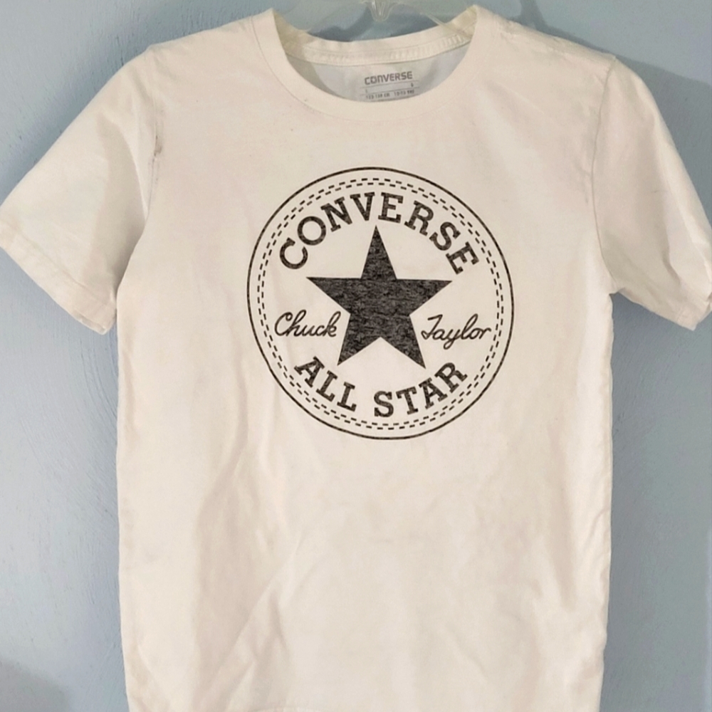 The brand Converse, size is Large (12-13yrs)